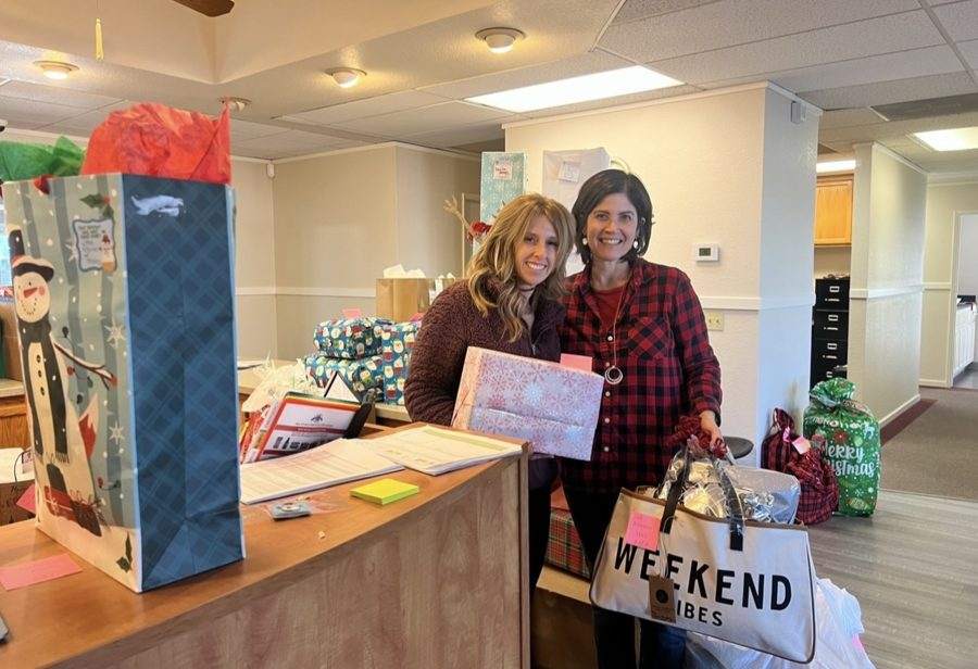 Jill delivering holiday gifts to Elk Grove Food Bank Services