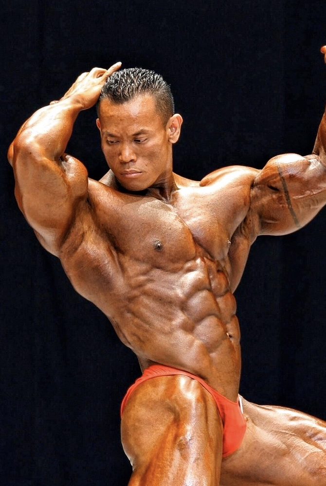 IFBB Pro Kris Dim on stage