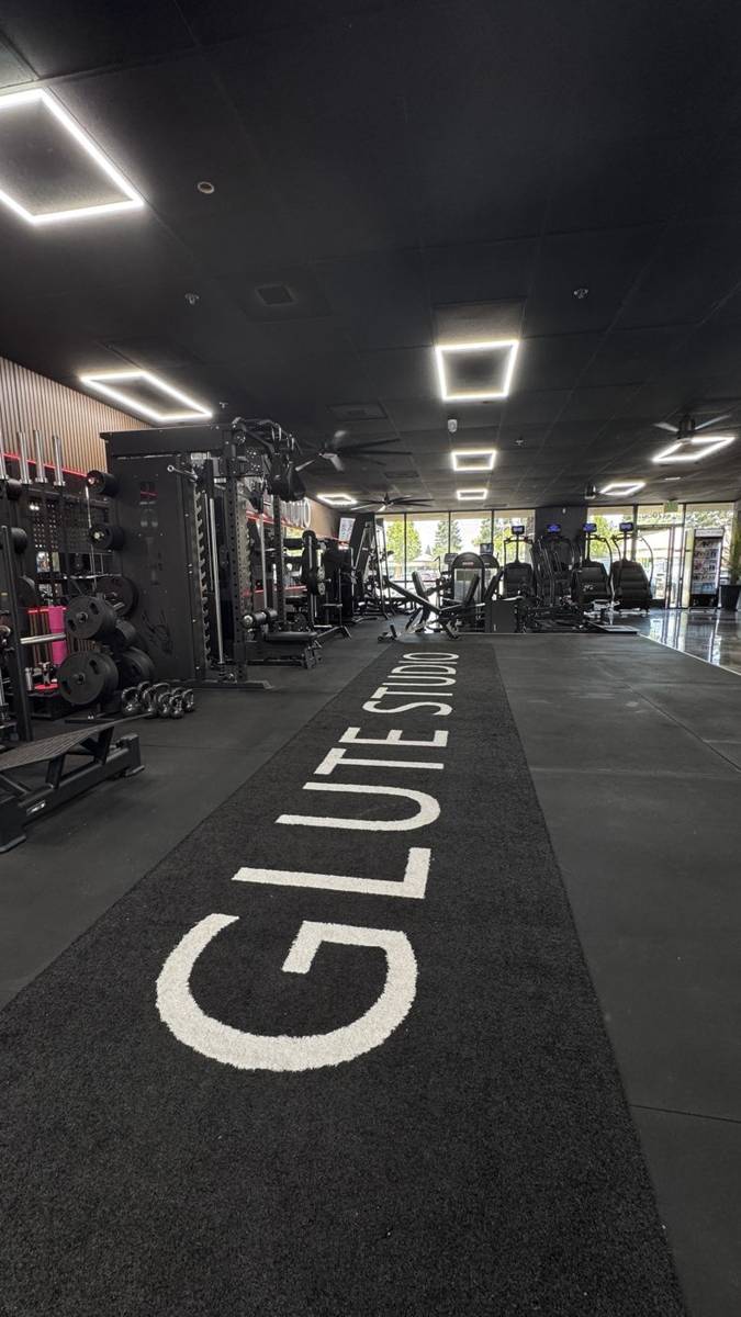 GLUTE STUDIO runway turf leading through the training floor